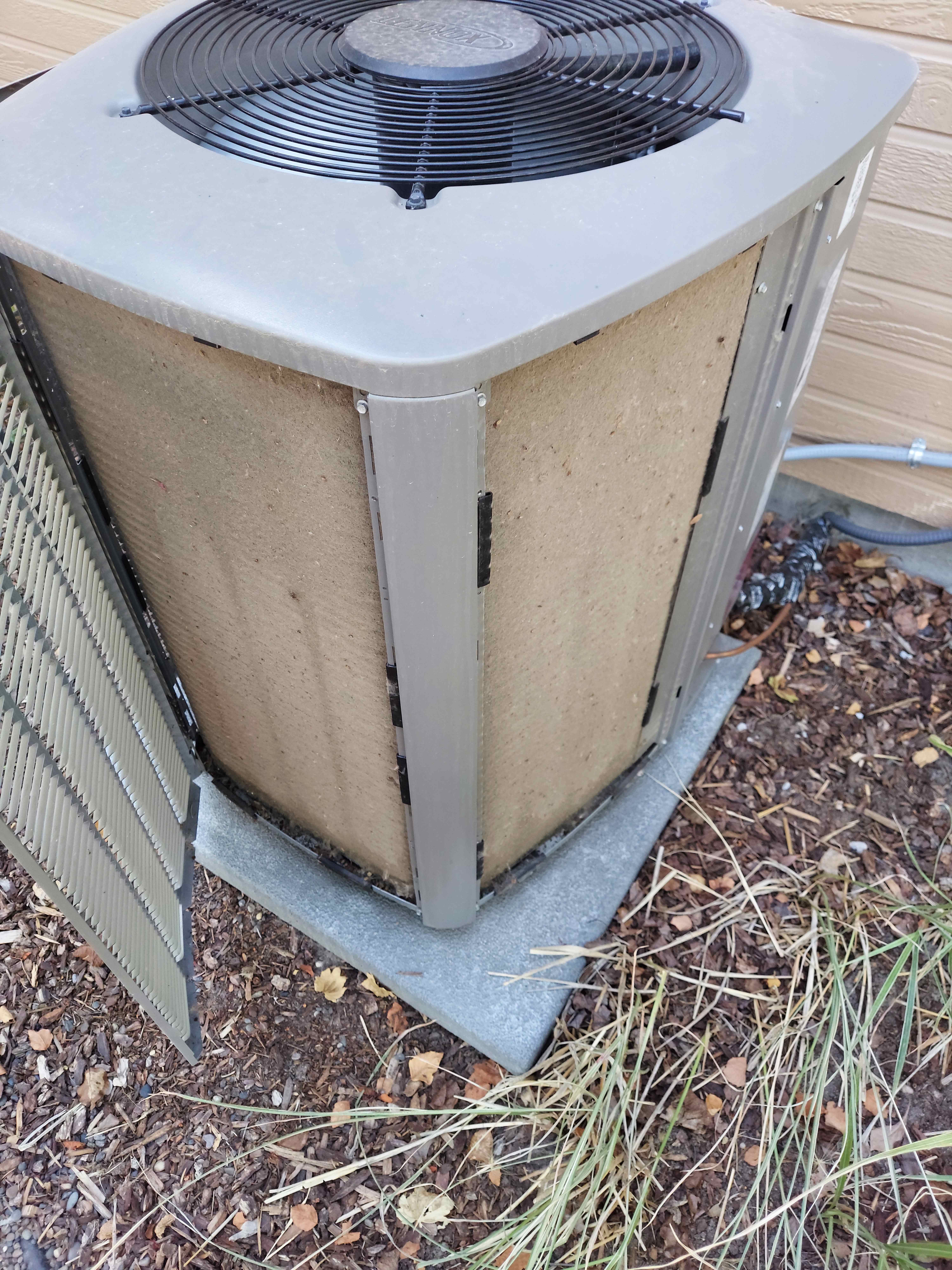 Clogged AC condenser coil before maintenance