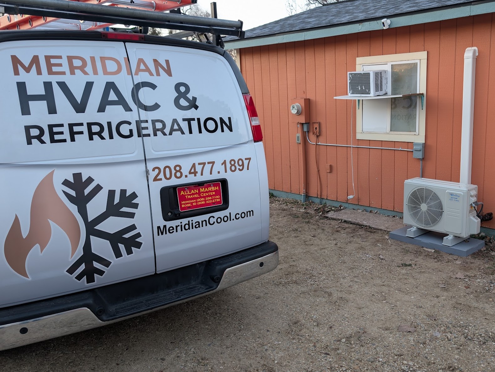 Meridian HVAC service van at residential heat pump installation in Idaho