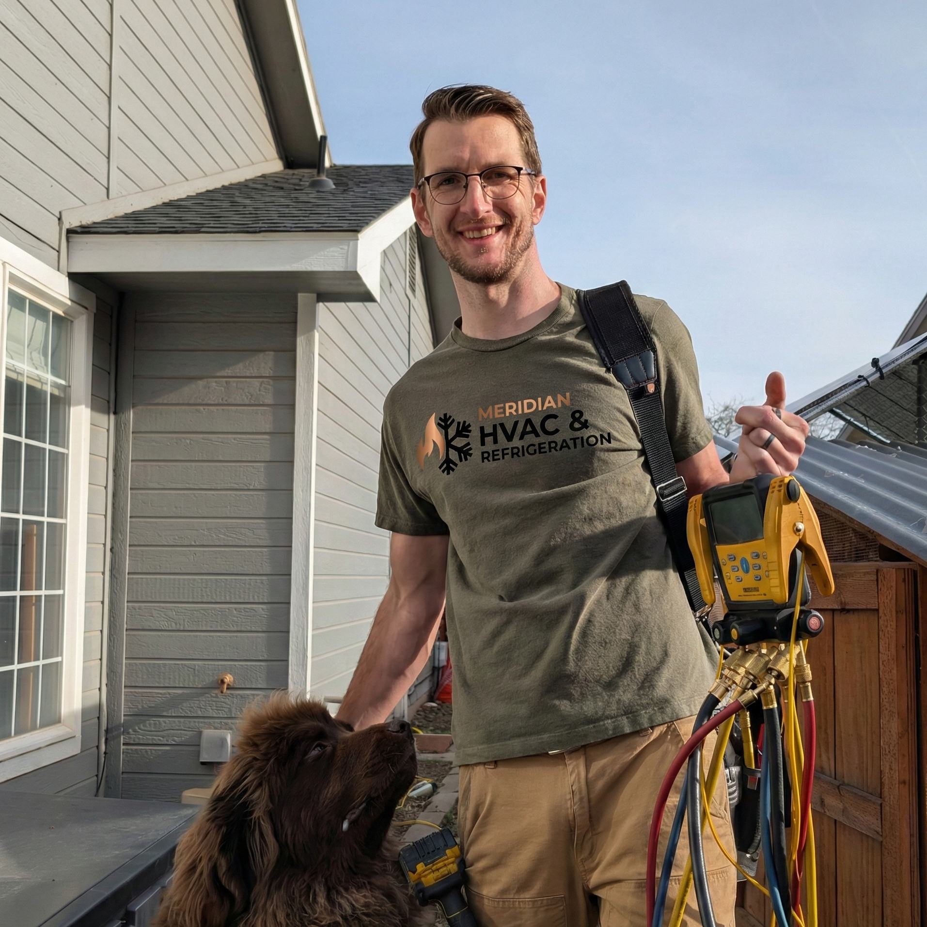 Meridian HVAC & Refrigeration technician with service dog at residential home